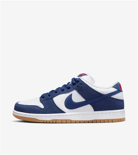 nike low dunk blau|Nike dunks with blue swoosh.